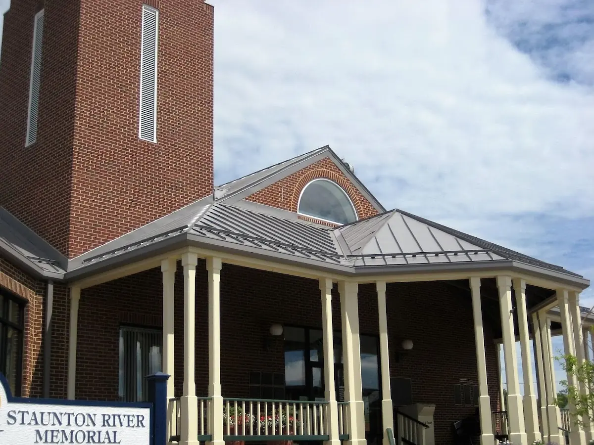 Skilled roofing craftsmen working on a residential roof in Fountain Inn